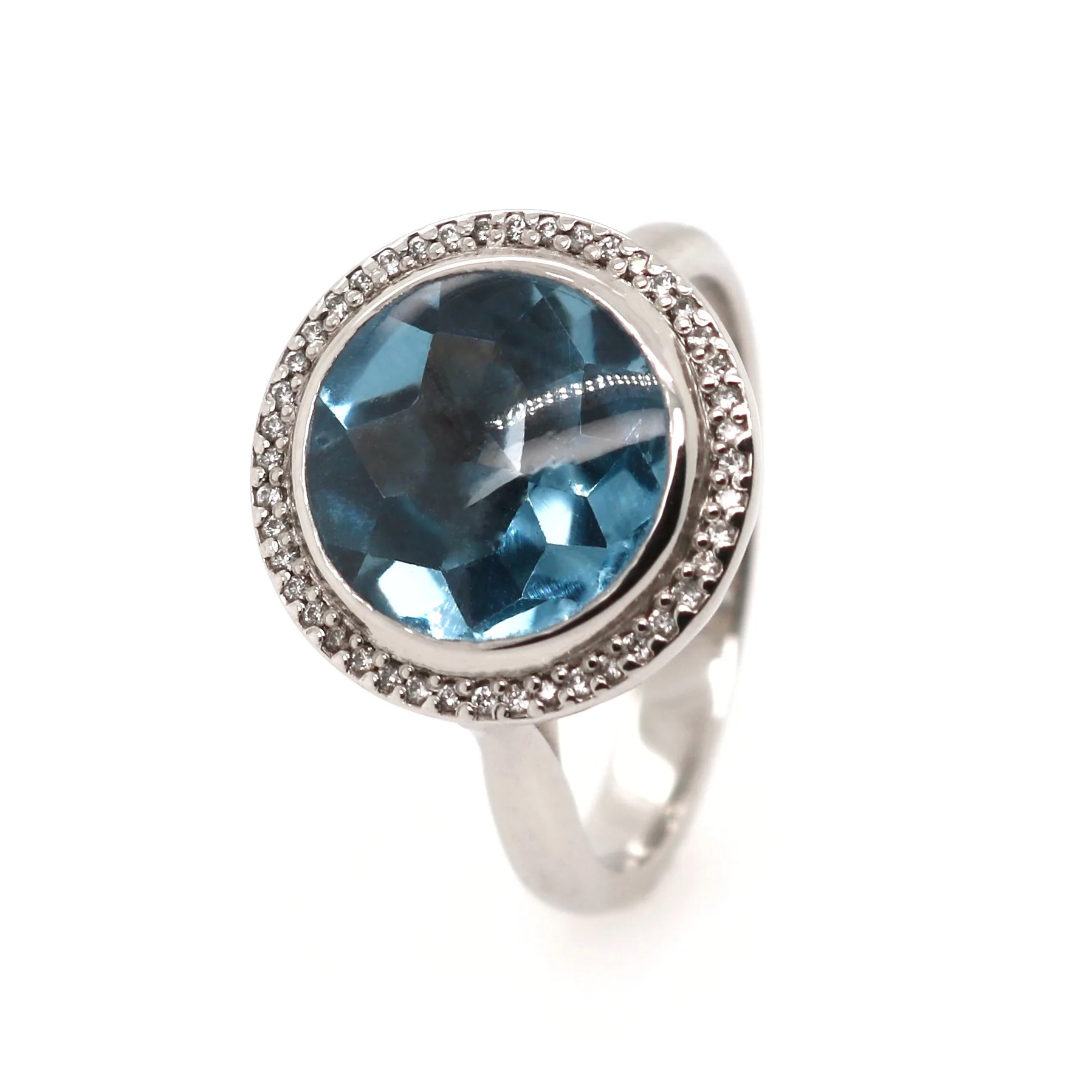 Platinum 4.50ct Mixed Cut Blue Topaz and Diamond Halo Ring