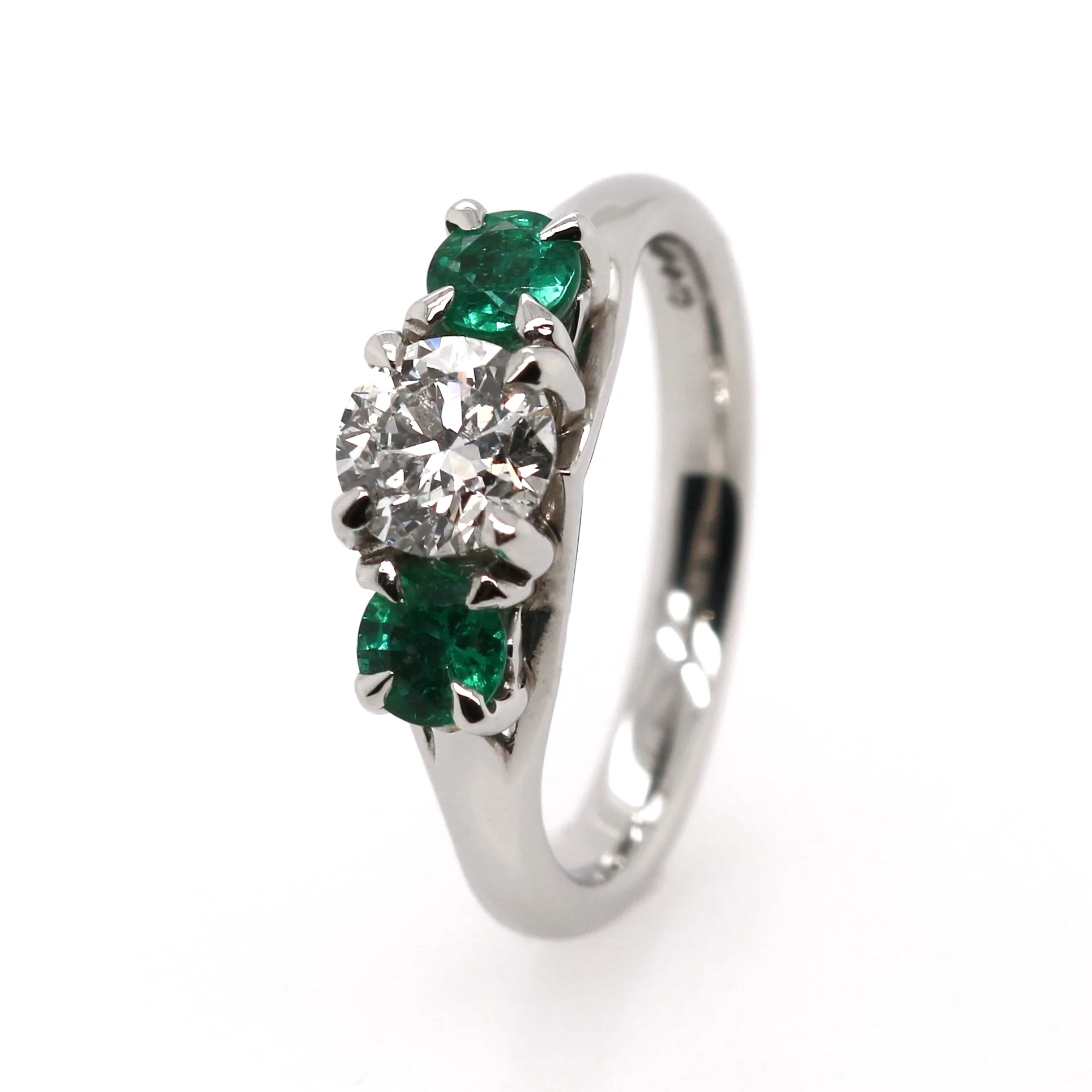 Platinum 1.20ct Round Brilliant Cut Emerald and Diamond Trilogy Ring