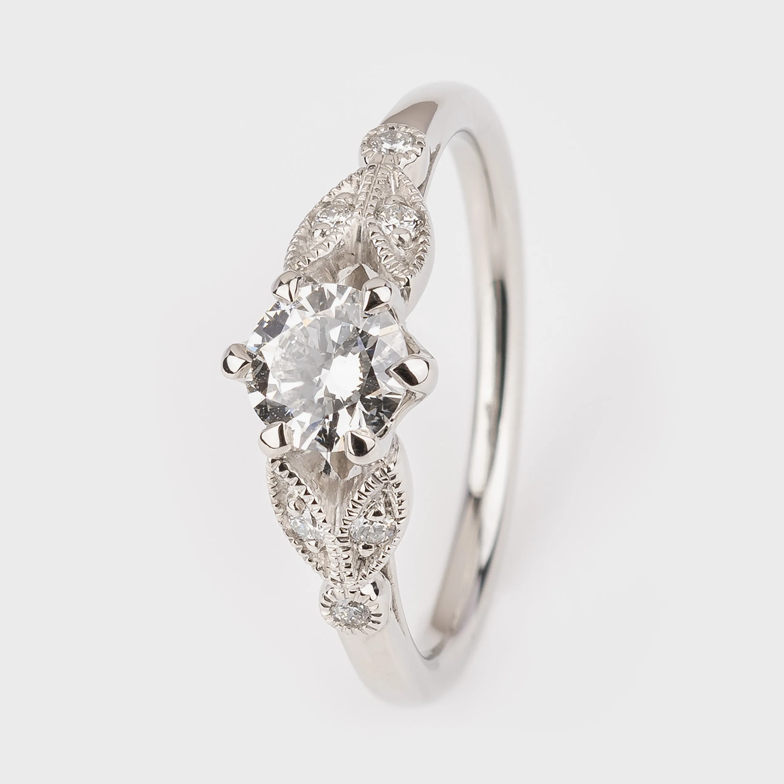 Platinum 0.60ct Round Brilliant Cut Diamond Solitaire Leaf Ring