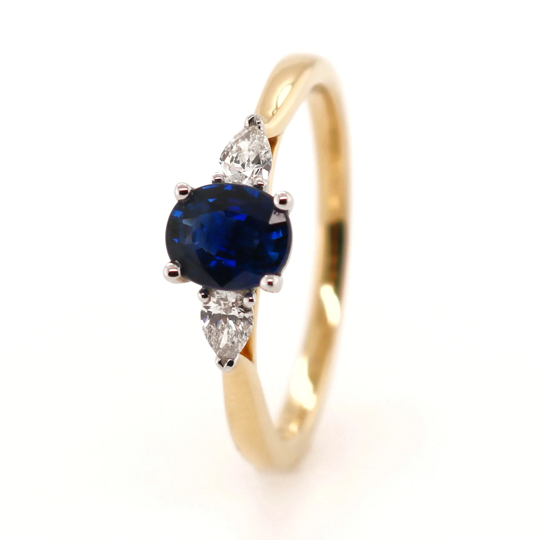18ct Yellow Gold 0.89ct Mixed Cut Sapphire and Diamond Trilogy Ring