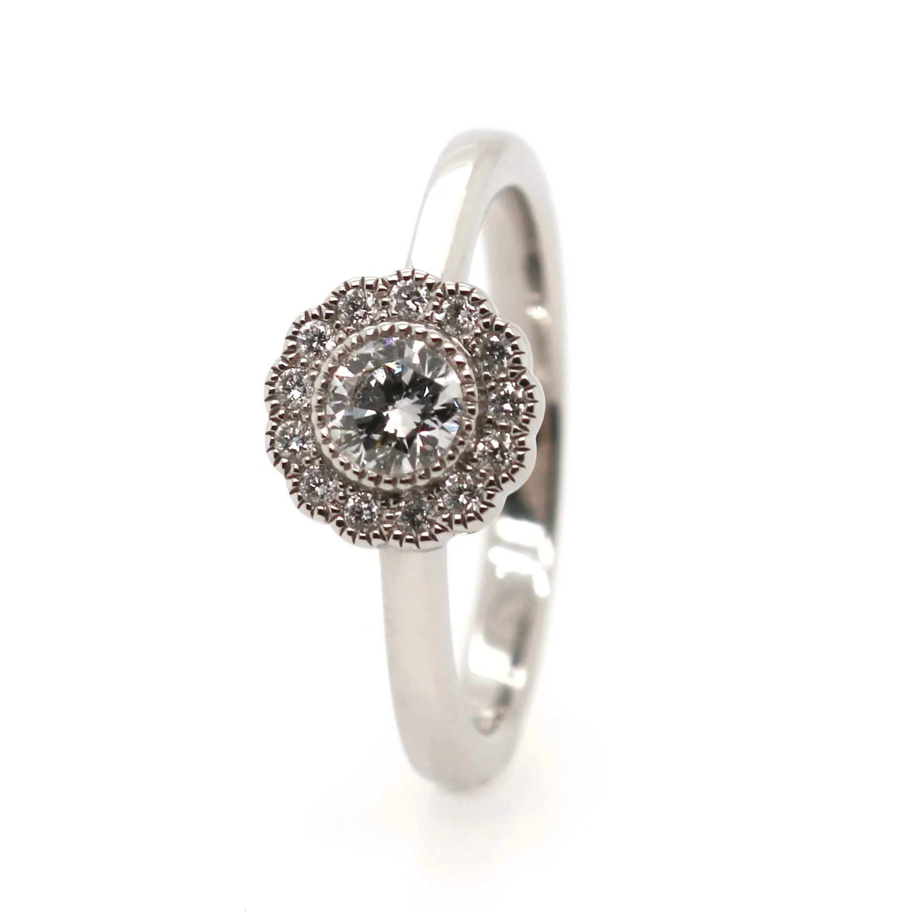 Platinum 0.59ct Round Brilliant Cut Diamond Halo Ring