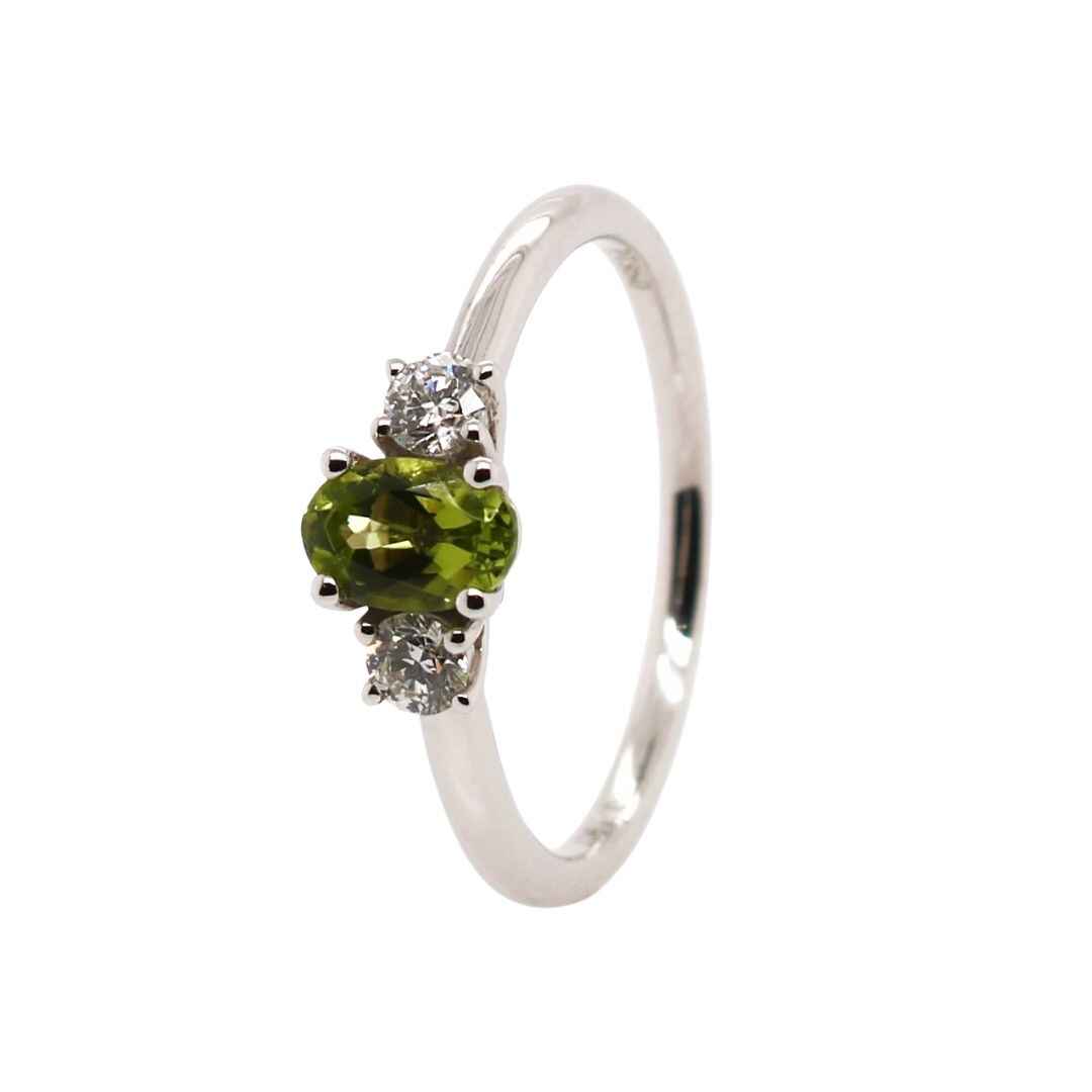 Platinum 0.71ct Mixed Cut Peridot and Diamond Trilogy Ring