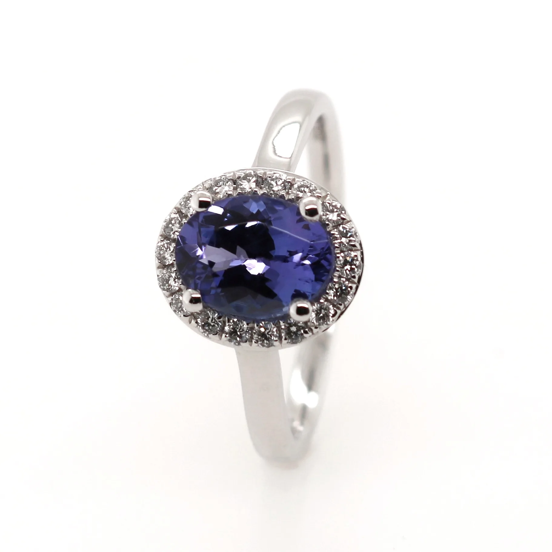 Platinum 1.50ct Mixed Cut Tanzanite and Diamond Halo Ring