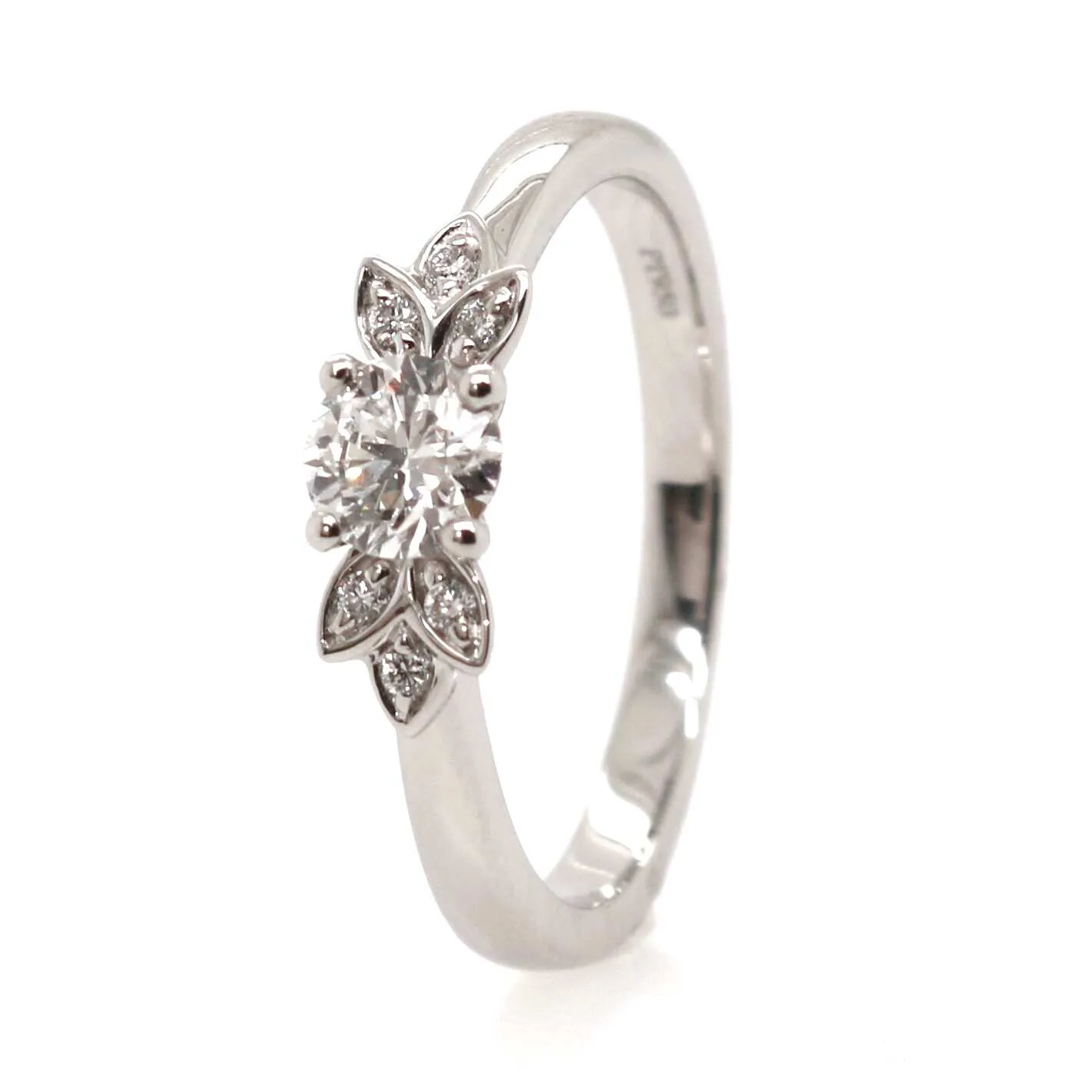 Platinum 0.32ct Round Brilliant Cut Diamond Solitaire Flower Ring