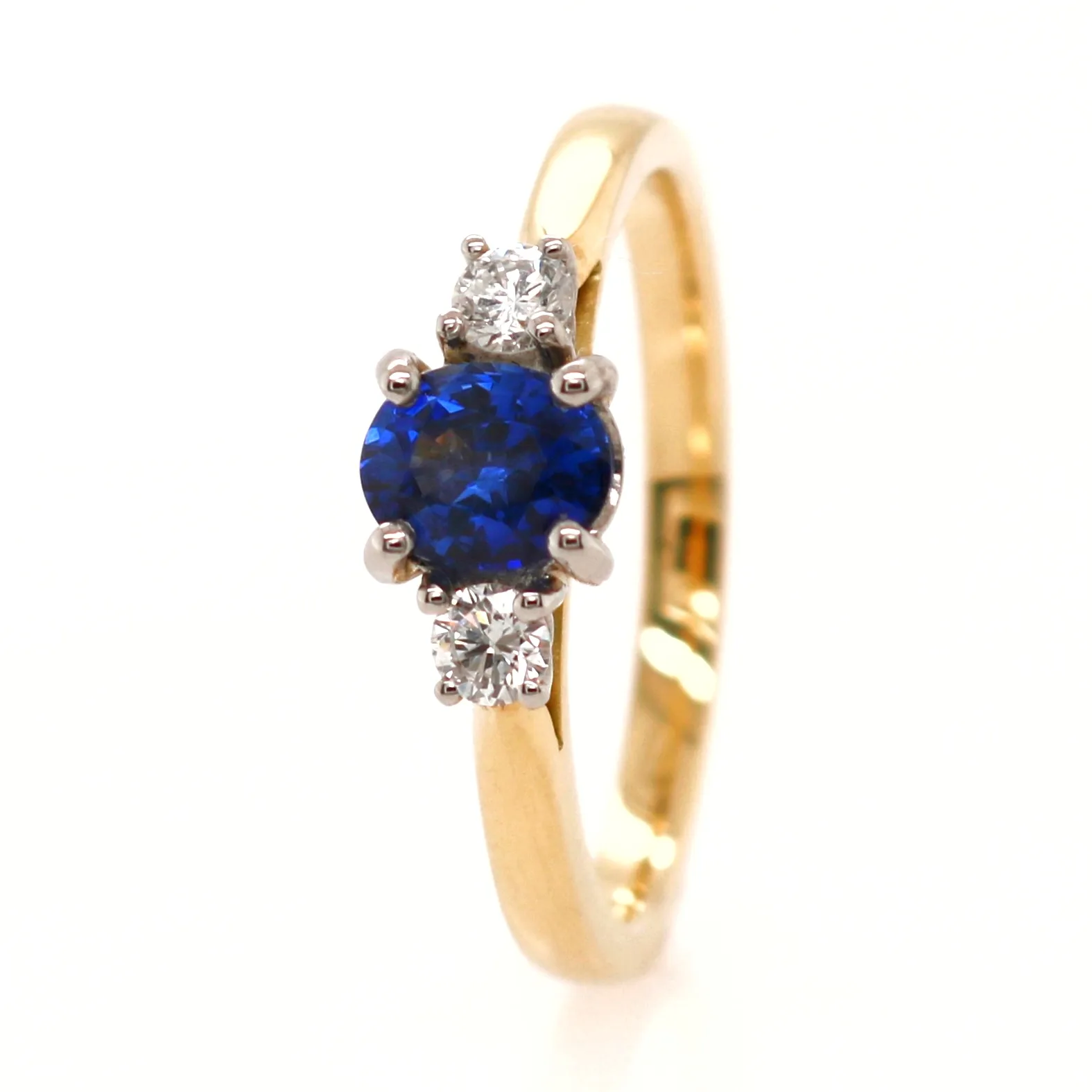 18ct Yellow Gold 0.77ct Round Brilliant Cut Sapphire and Diamond Trilogy Ring