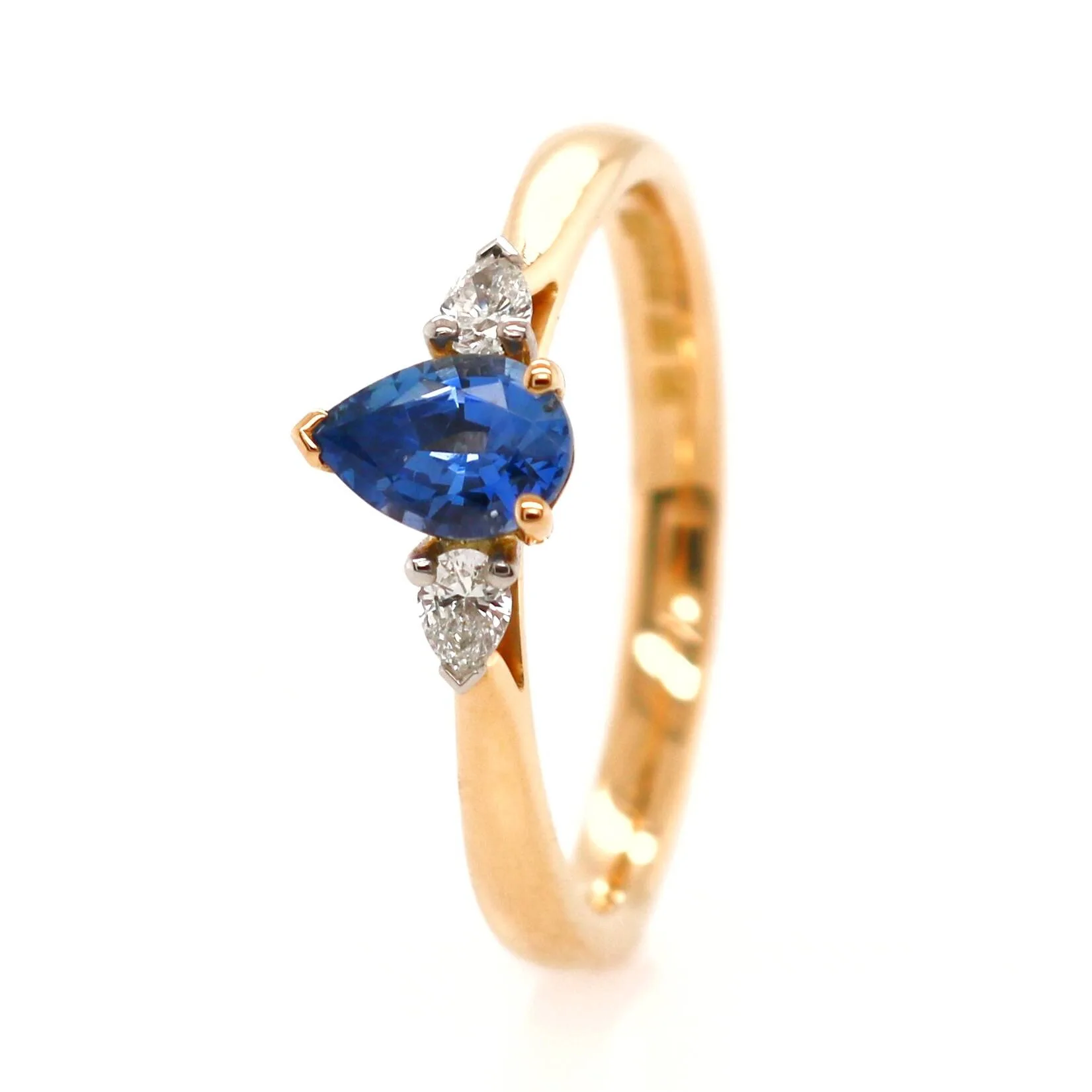 18ct Yellow Gold 0.64ct Pear Cut Sapphire and Diamond Trilogy Ring