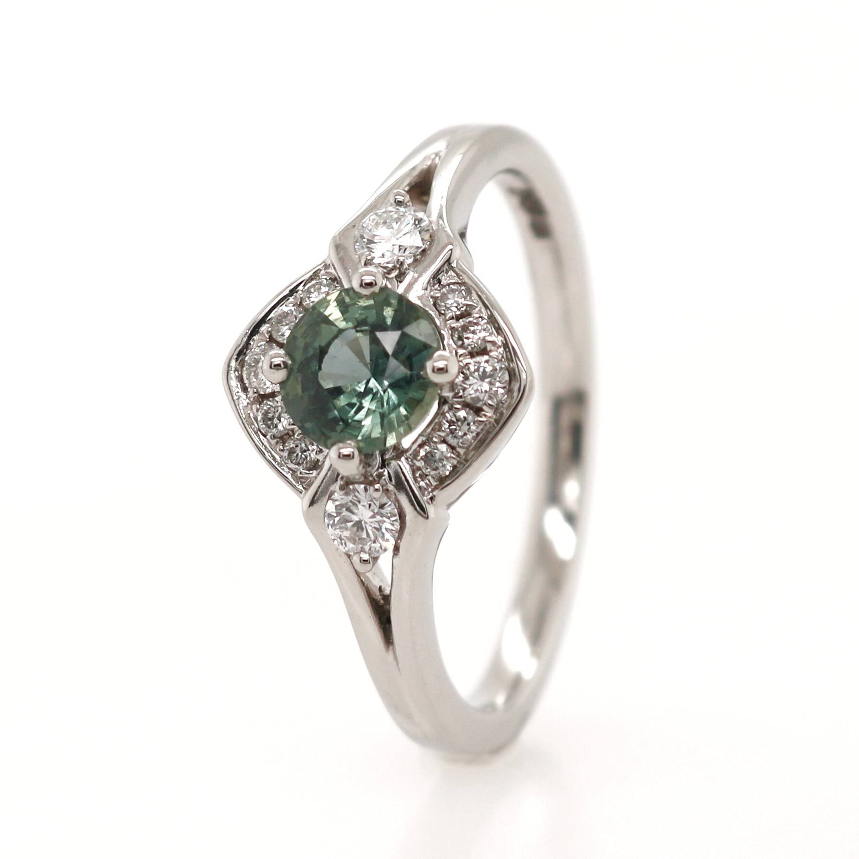 Platinum 0.76ct Round Brilliant Cut Green Sapphire and Diamond Halo Ring