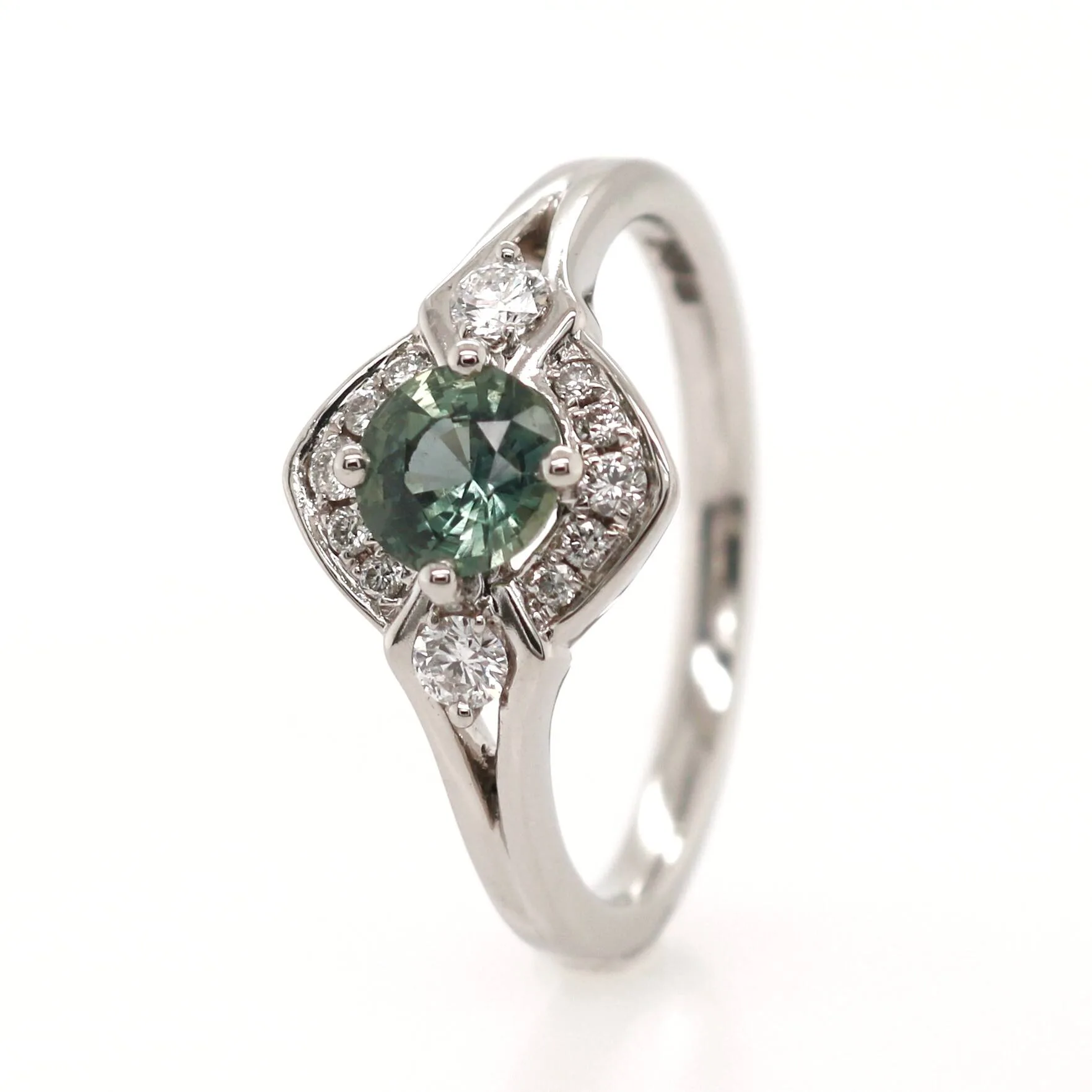 Platinum 0.76ct Round Brilliant Cut Green Sapphire and Diamond Halo Ring